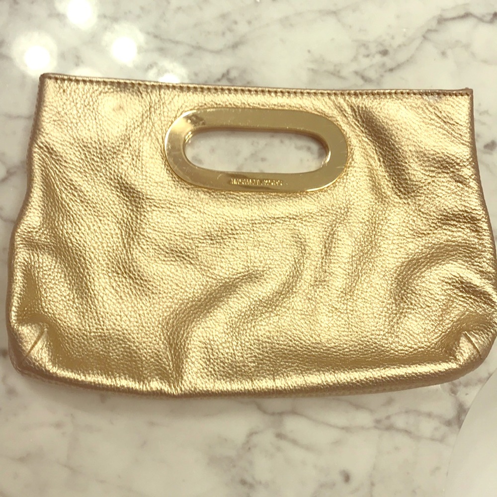 MICHAEL KORS gold clutch